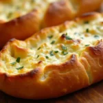 Close-up of freshly baked Cunetto's garlic cheese bread.