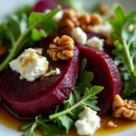 A beautifully plated Balthazar beet salad with vibrant colors and textures